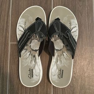 Clark’s flip flops